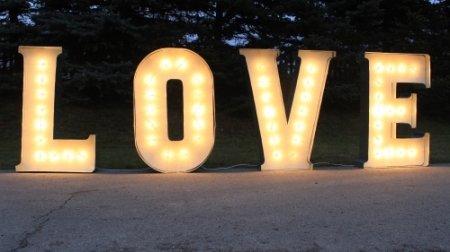 Šviečiantis LOVE ženklas logo